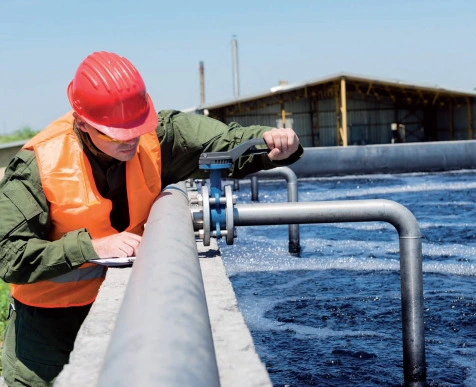 Consultant checking a commercial wastewater treatment site